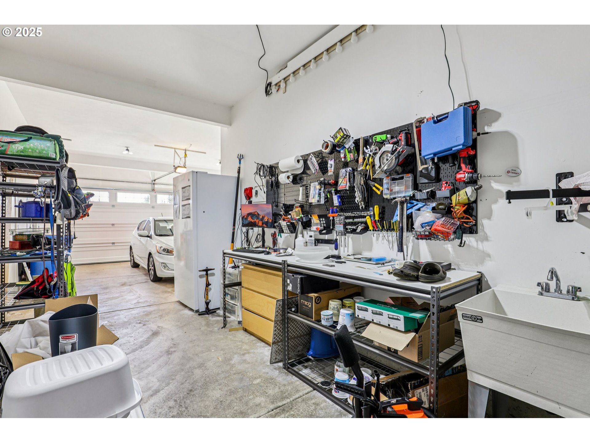 714 Southeast 37th Street Battle Ground, WA 98604 - Photo 18 of 21 a living room with lots of furniture and clutter