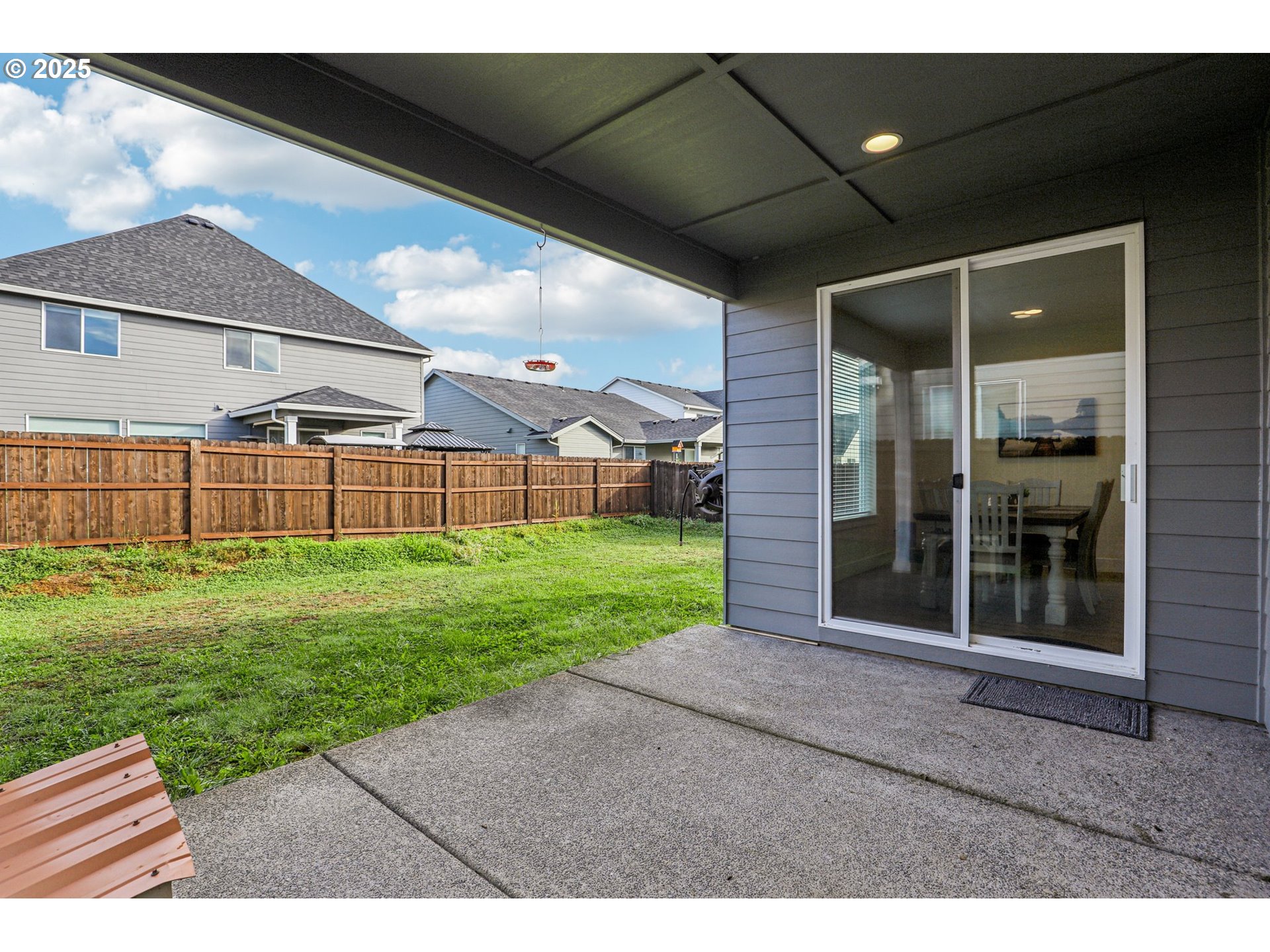 714 Southeast 37th Street Battle Ground, WA 98604 - Photo 19 of 21 a view of a backyard with table and chairs and garden