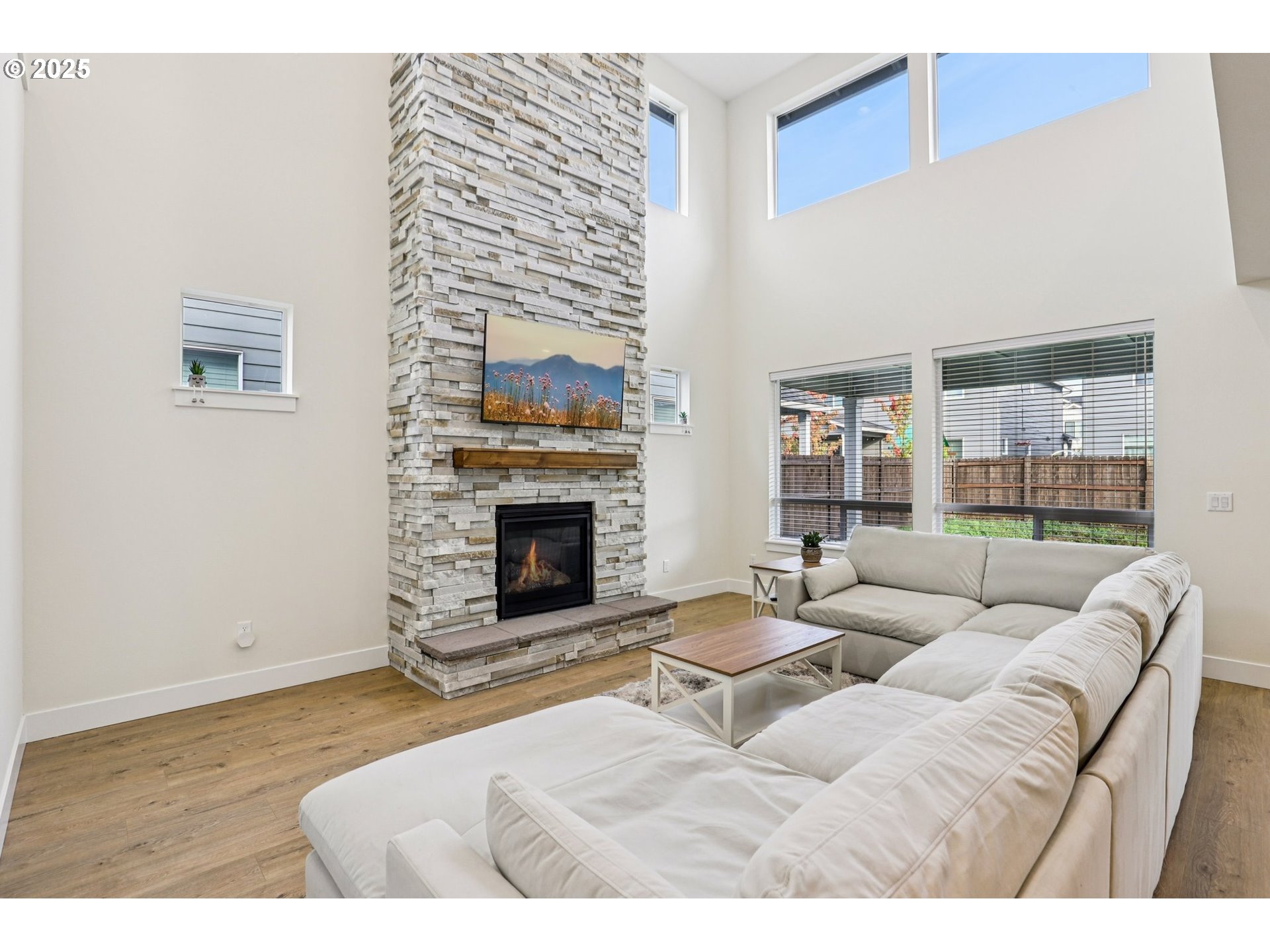 714 Southeast 37th Street Battle Ground, WA 98604 - Photo 2 of 21 a living room with furniture and a fireplace