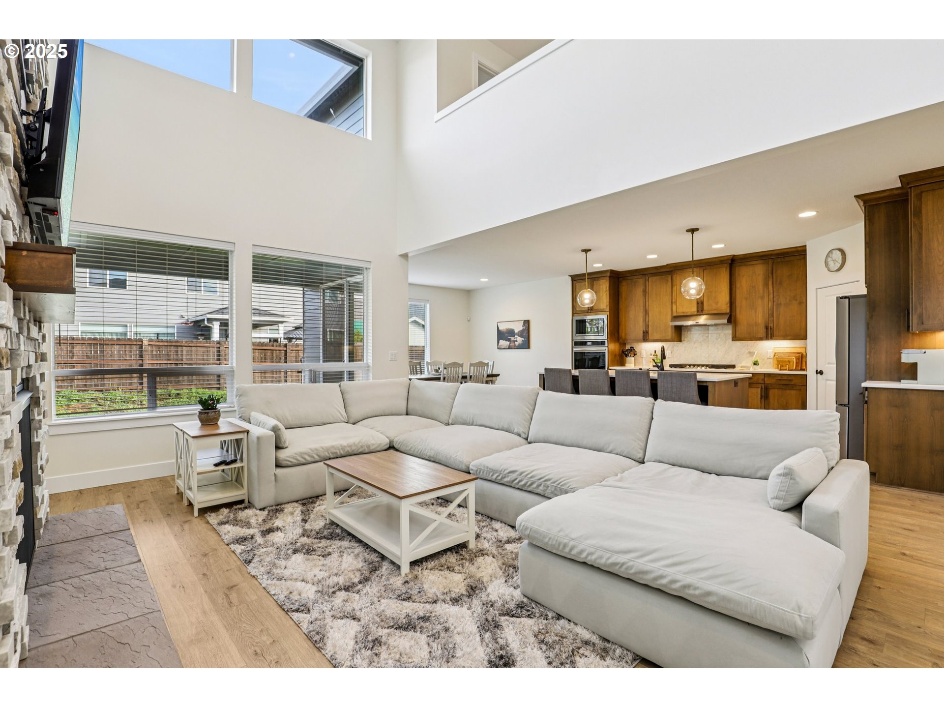 714 Southeast 37th Street Battle Ground, WA 98604 - Photo 3 of 21 a living room with furniture and a large window