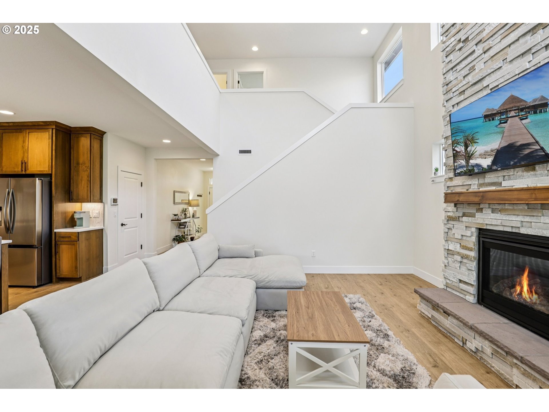 714 Southeast 37th Street Battle Ground, WA 98604 - Photo 4 of 21 a living room with furniture and a fireplace