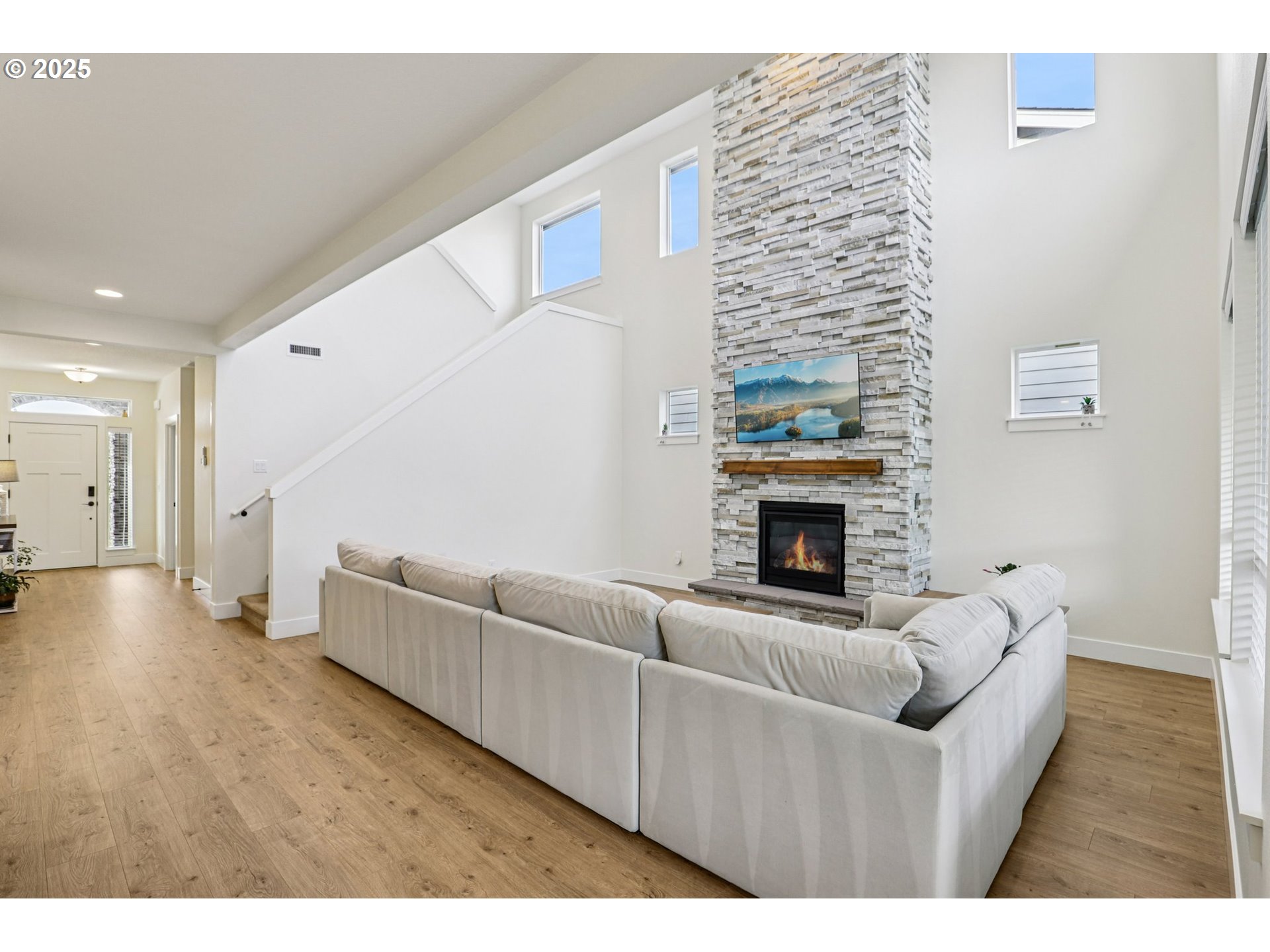 714 Southeast 37th Street Battle Ground, WA 98604 - Photo 5 of 21 a living room with furniture and a fireplace