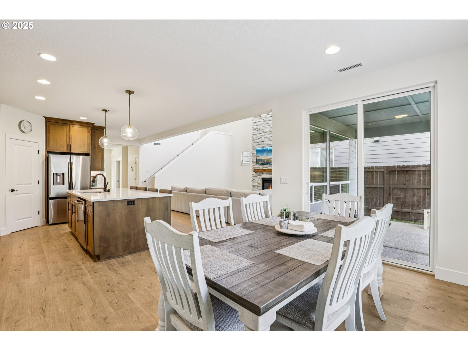 714 Southeast 37th Street Battle Ground, WA 98604 - Photo 8 of 21 a dining room with furniture and wooden floor