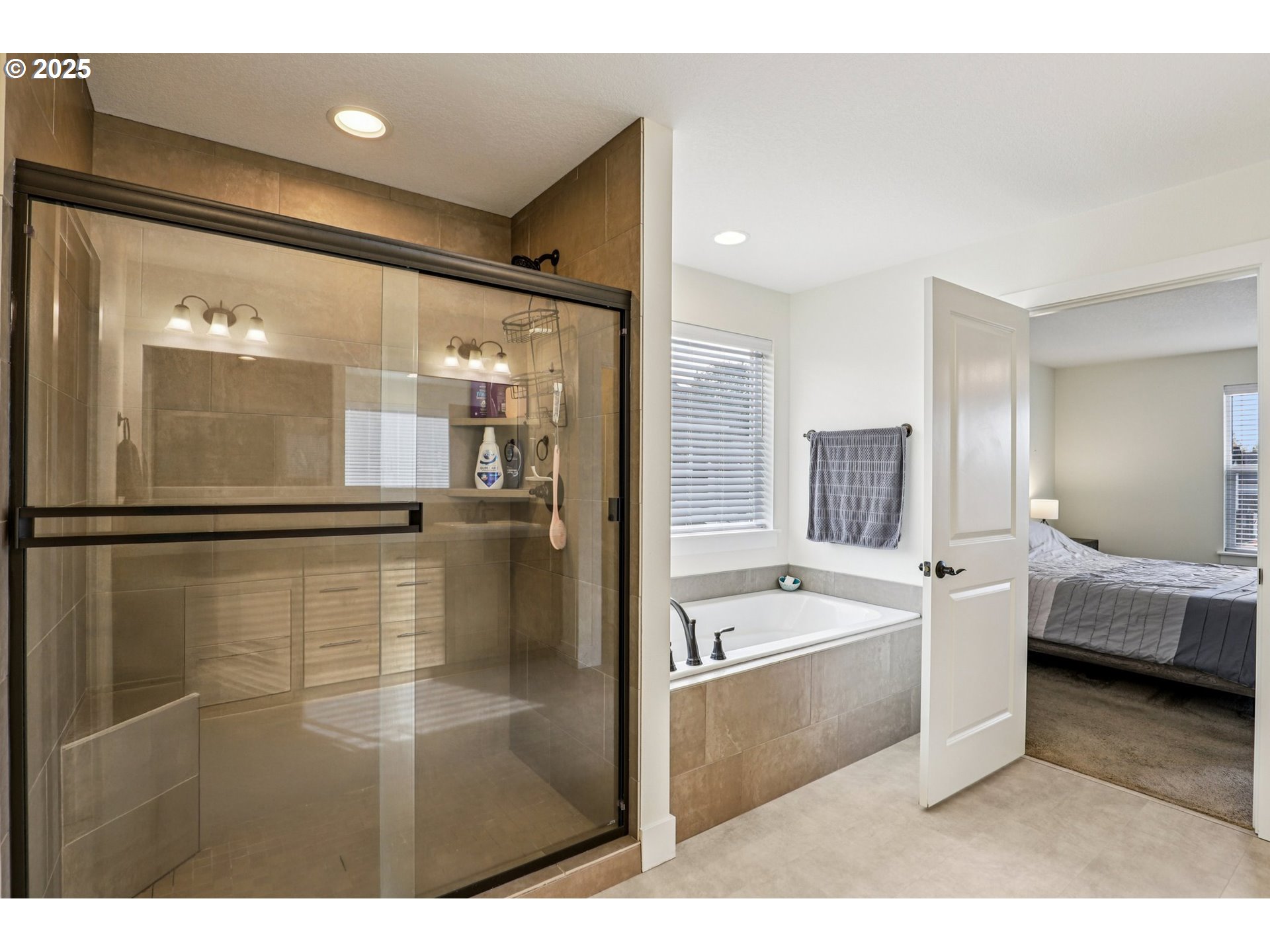 714 Southeast 37th Street Battle Ground, WA 98604 - Photo 10 of 21 a bathroom with a tub shower and sink