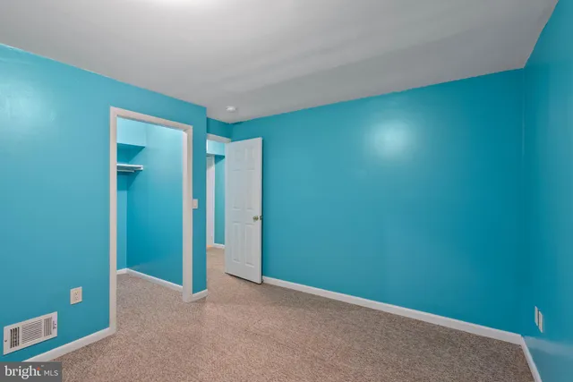 an empty room with closet