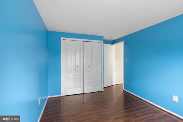 a bathroom with a shower a toilet and a sink