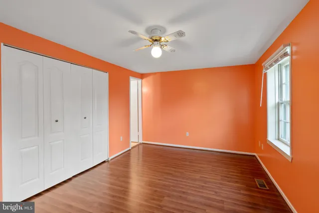 a bathroom with a mirror and a sink