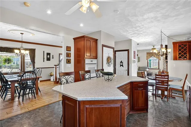 a view of a a dining room with furniture window and outside view