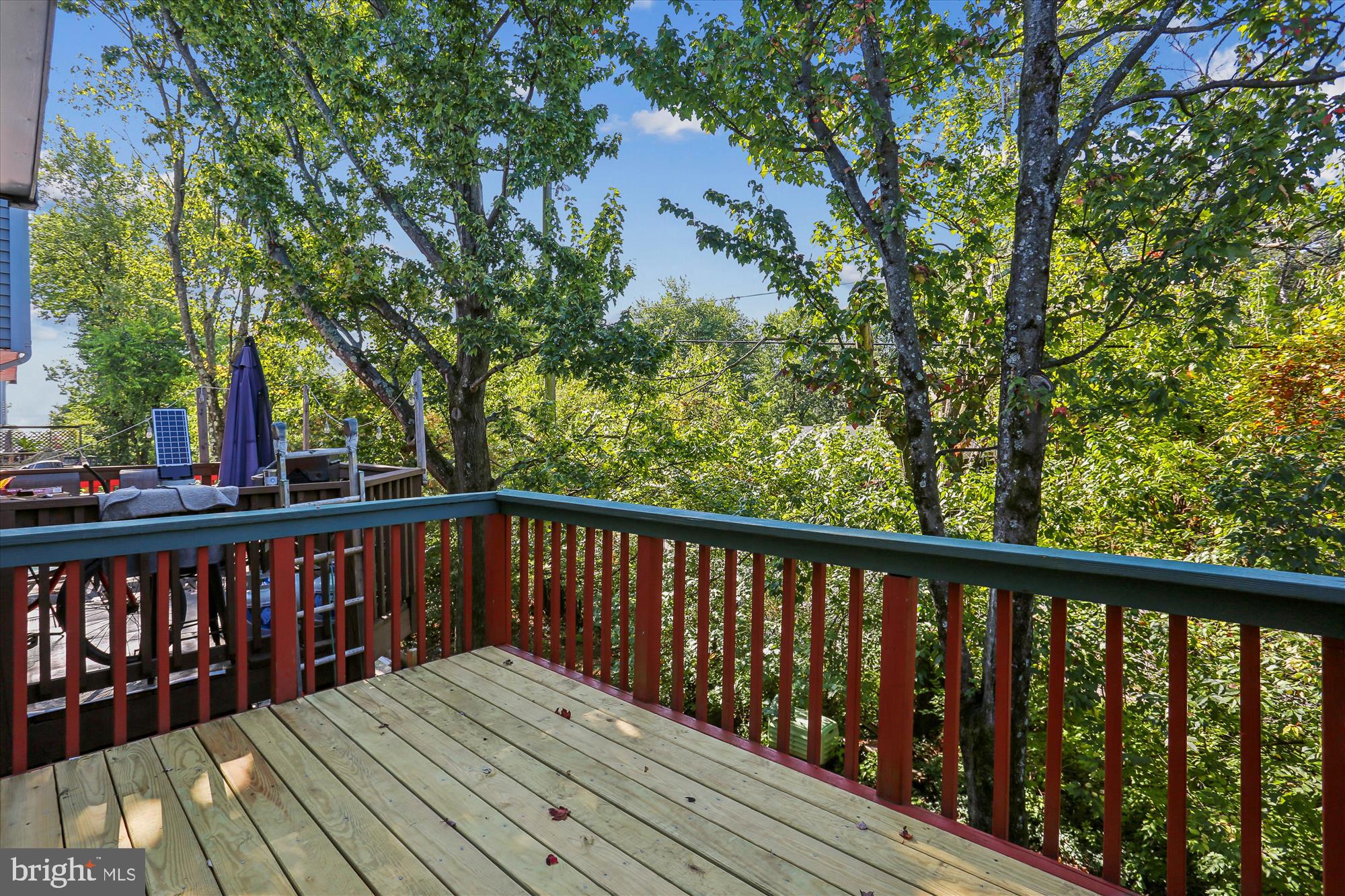 2839 Shepperton Terrace Silver Spring, MD 20904 - Photo 20 of 48 a balcony with wooden floor and fence