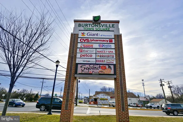 a view of a park with welcome board