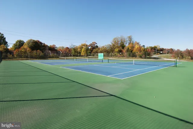a view of a house with a big yard