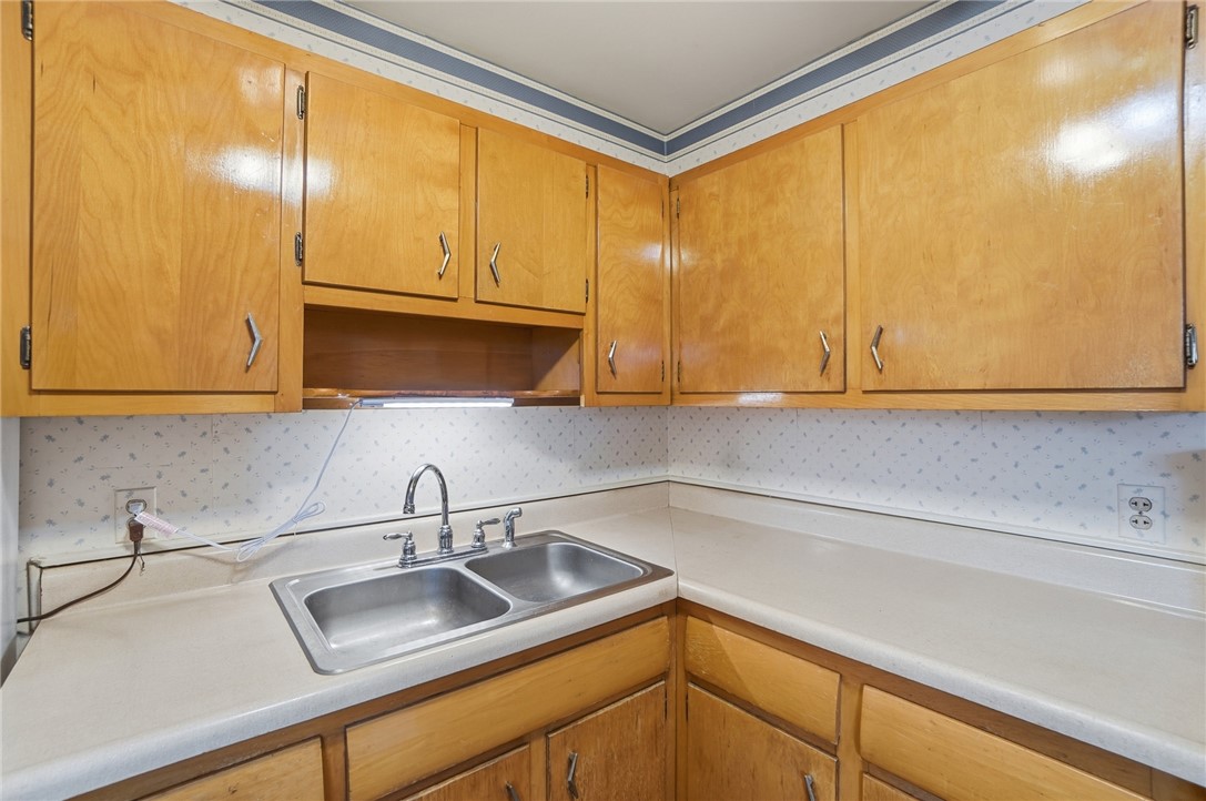 1087 Fairfield Road Troy, OH 45373 - Photo 14 of 39 This functional kitchen provides a practical layout for daily culinary activities.