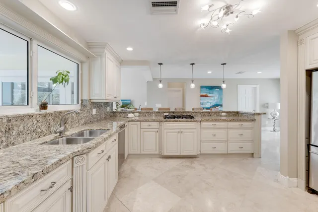 a bath room with a bath tub and a sink