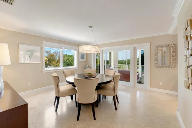 a bathroom with a granite countertop sink a large mirror and a