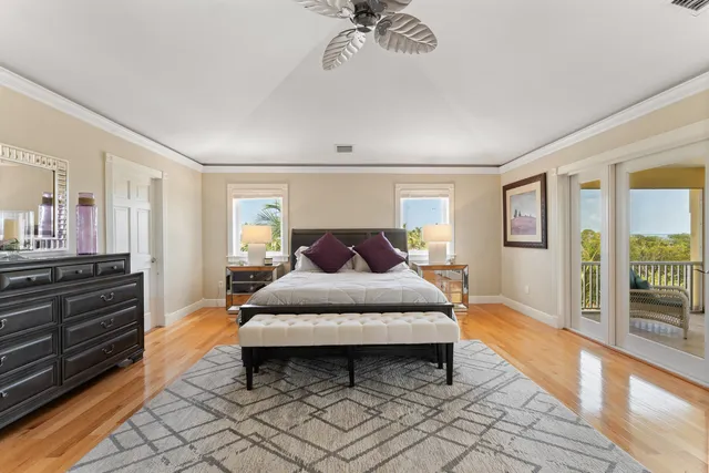 a view of a patio with a table chairs and a backyard