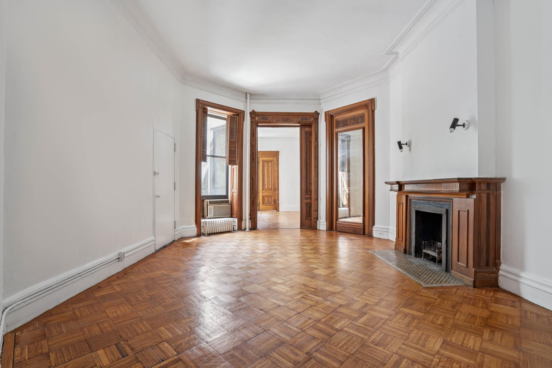 142 East 37th Street, Unit 23 Manhattan, NY 10016 - Photo 4 of 15 an empty room with fireplace