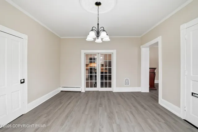 a kitchen with a sink stove and refrigerator
