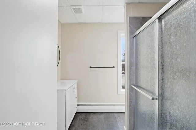 a view of a hallway with staircase