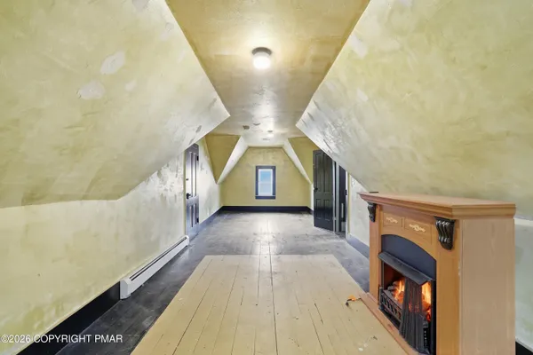 a view of a white house with a large windows