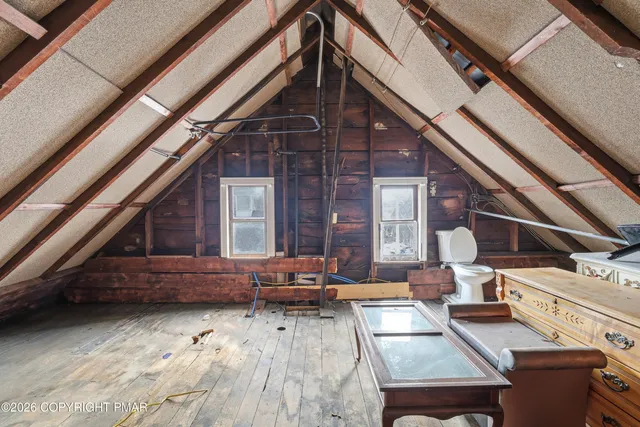 a view of multiple houses with yard