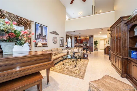 a kitchen with stainless steel appliances granite countertop a stove refrigerator sink and cabinets