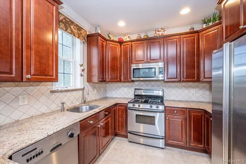 a kitchen with lots of counter top space and dining table