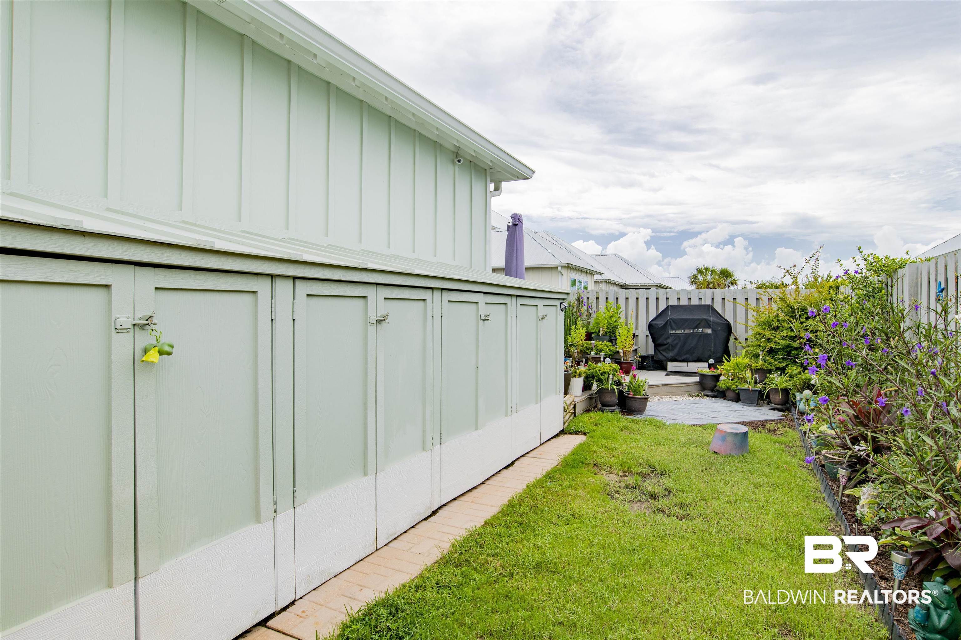 4845 Cypress Loop Orange Beach, AL 36561 - Photo 30 of 37 Backyard with outside storage