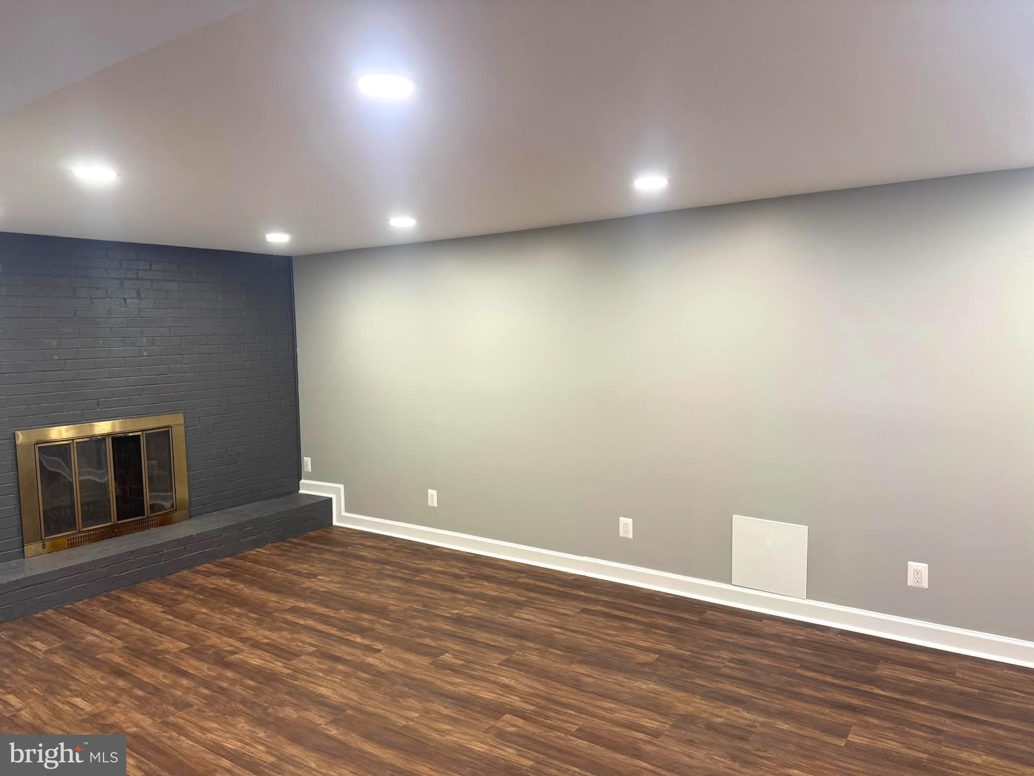 6602 Greenview Lane Springfield, VA 22152 - Photo 21 of 31 a view of an empty room with wooden floor and a window