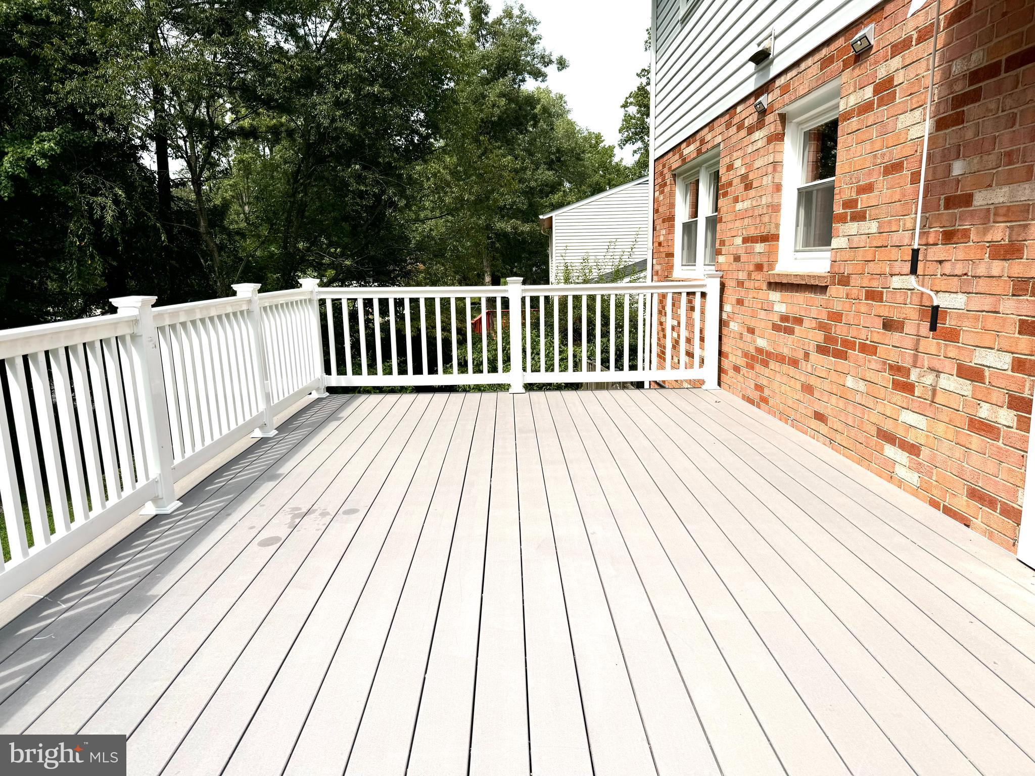 6602 Greenview Lane Springfield, VA 22152 - Photo 26 of 31 a view of backyard with deck