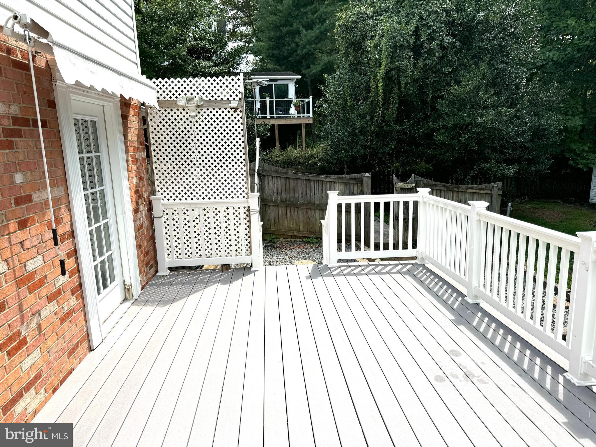 6602 Greenview Lane Springfield, VA 22152 - Photo 28 of 31 a view of outdoor space with deck and yard