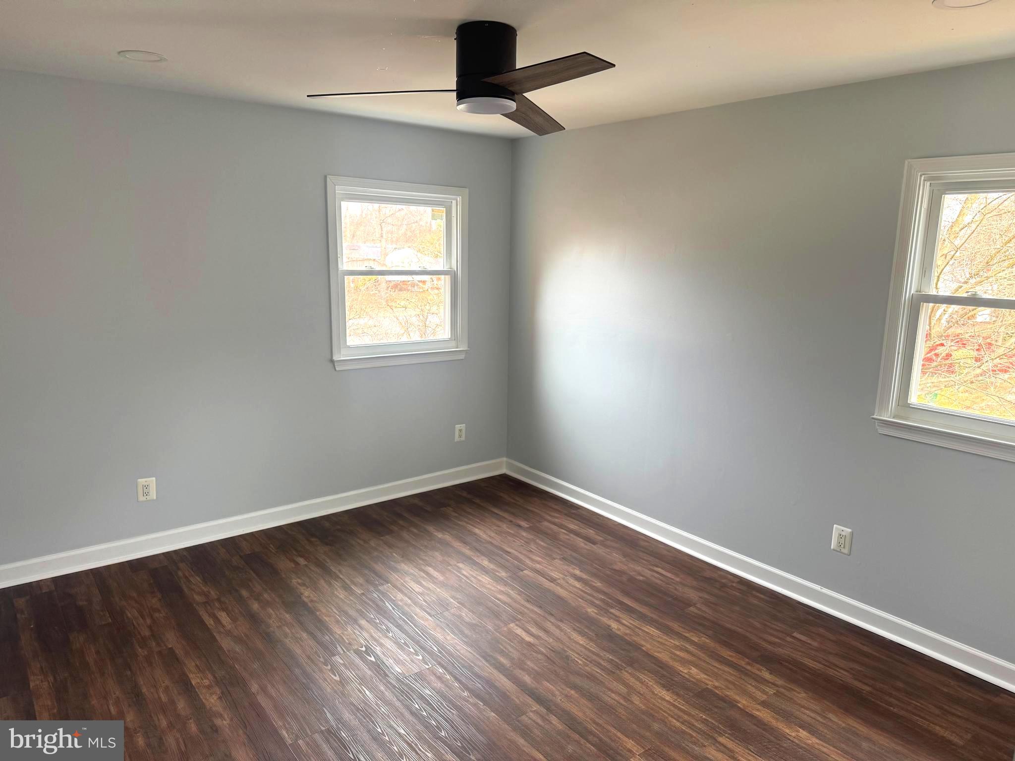 6602 Greenview Lane Springfield, VA 22152 - Photo 10 of 31 wooden floor in an empty room with a window