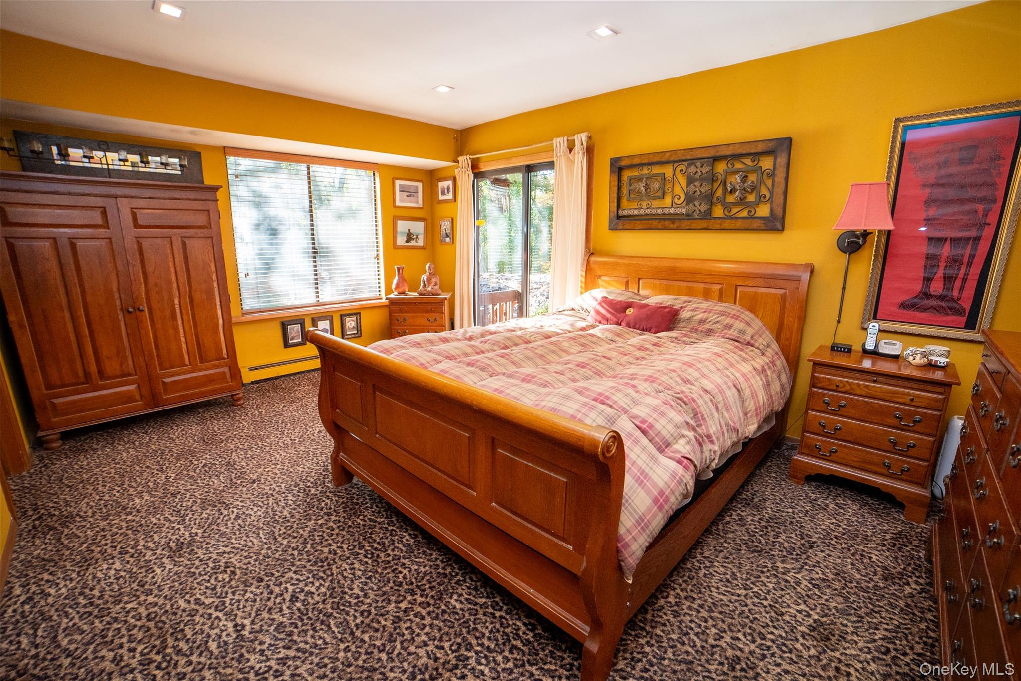 30 Long Bow Road Wading River, NY 11792 - Photo 12 of 19 a bed sitting in a room next to a window