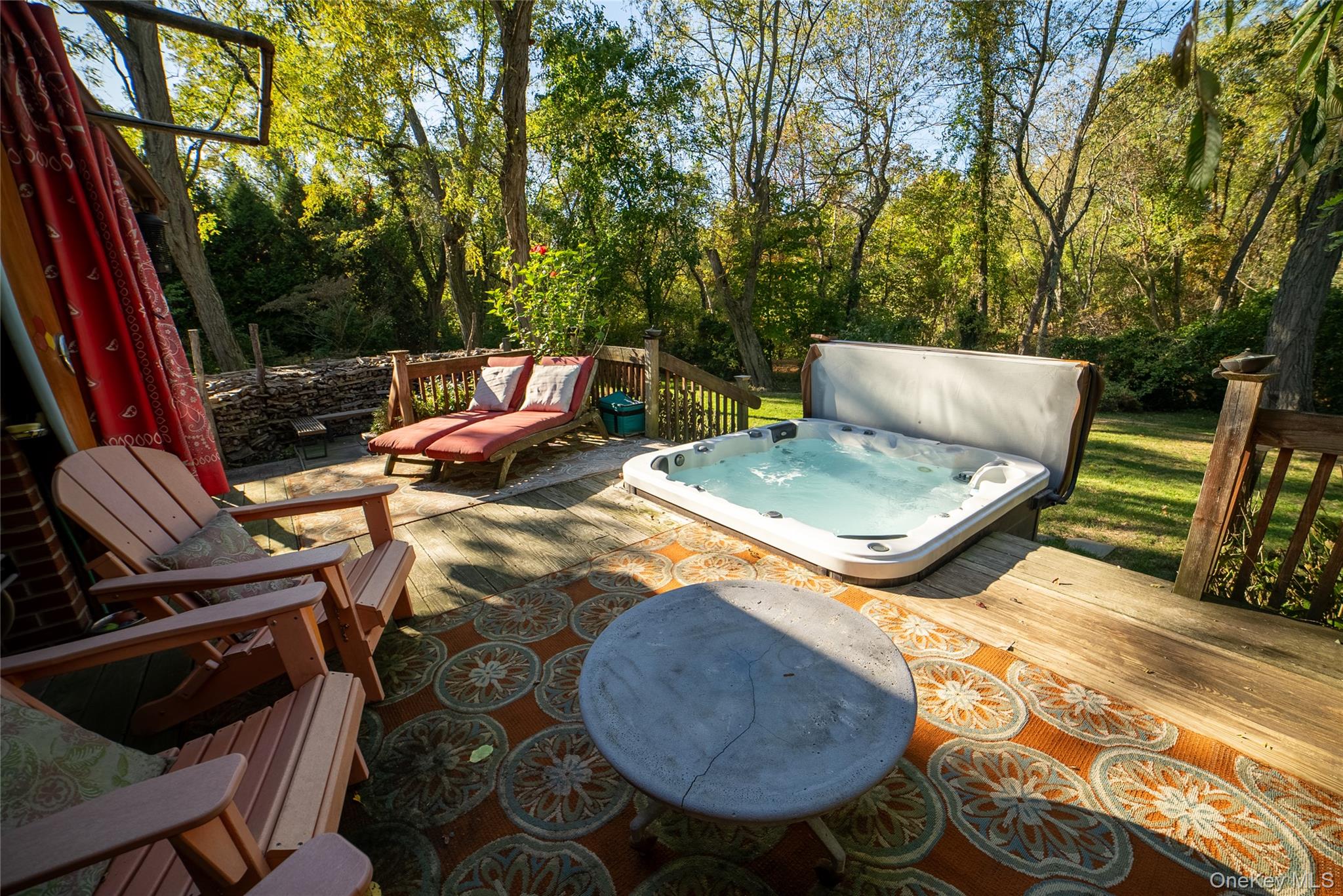 30 Long Bow Road Wading River, NY 11792 - Photo 17 of 19 a view of a backyard with sitting area