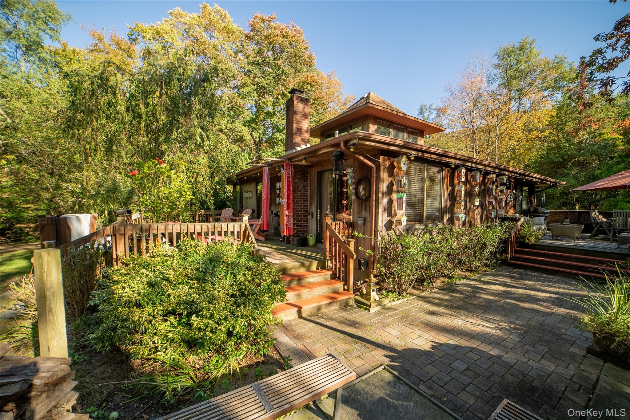 30 Long Bow Road Wading River, NY 11792 - Photo 18 of 19 a view of a pathway of the house