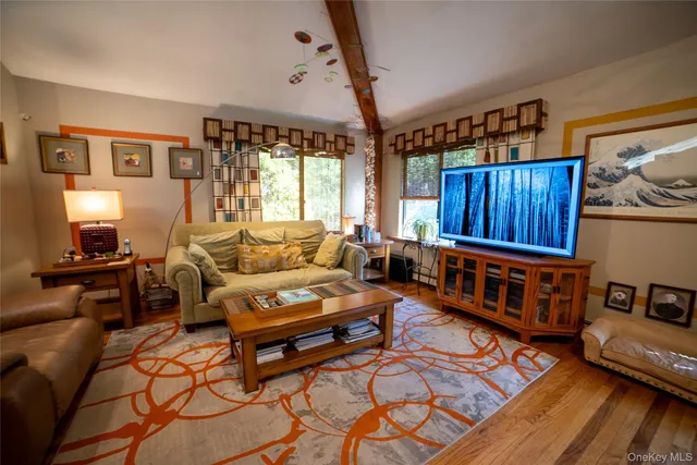 a living room with furniture and a table