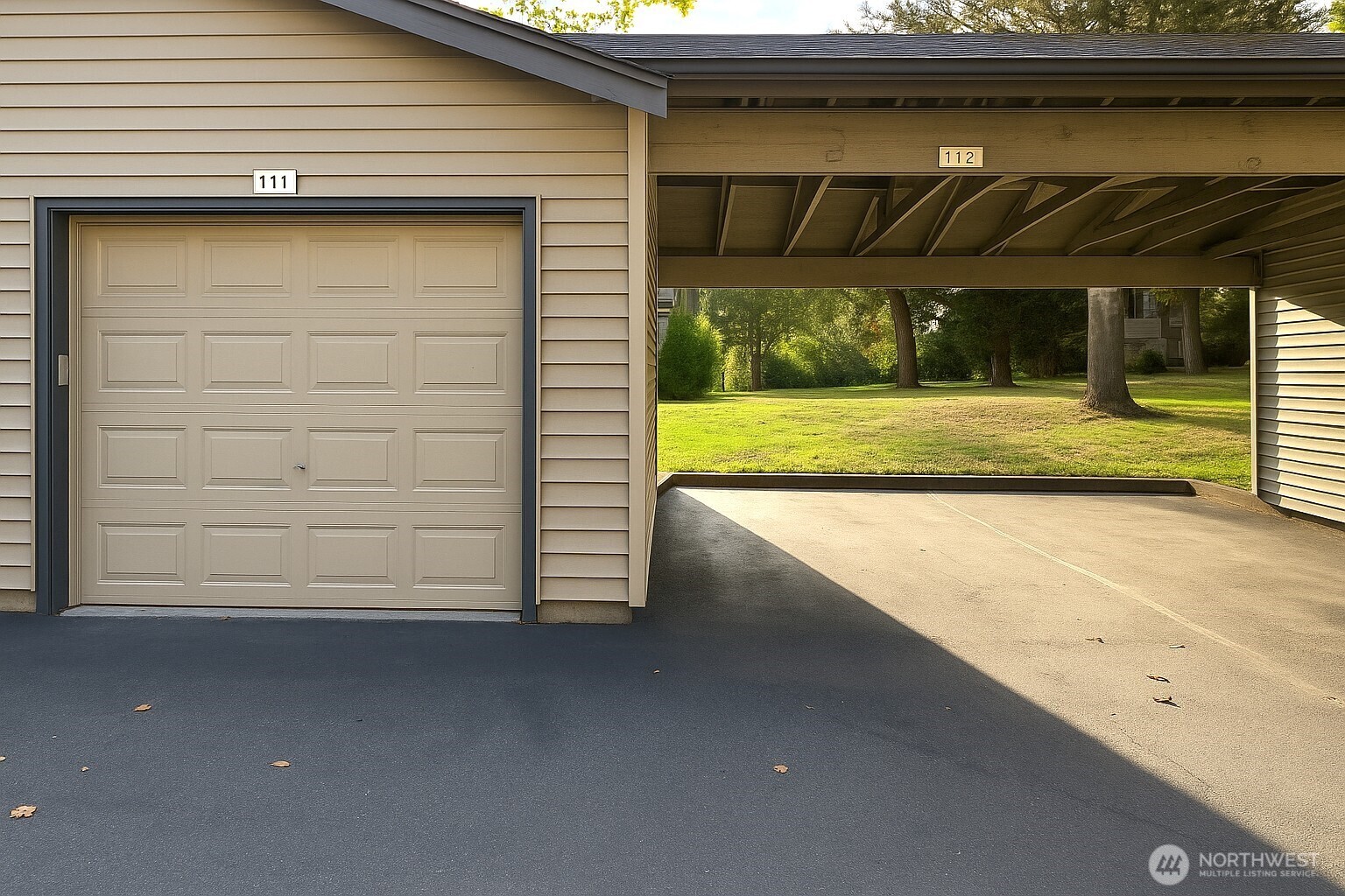 25025 Southeast Klahanie Boulevard, Unit D202 Issaquah, WA 98029 - Photo 12 of 23 a view of a house with a garage