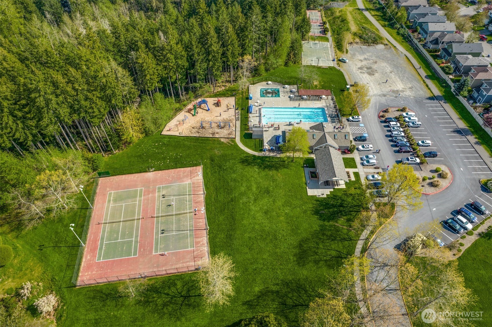 25025 Southeast Klahanie Boulevard, Unit D202 Issaquah, WA 98029 - Photo 22 of 23 an aerial view of a house with swimming pool garden and patio