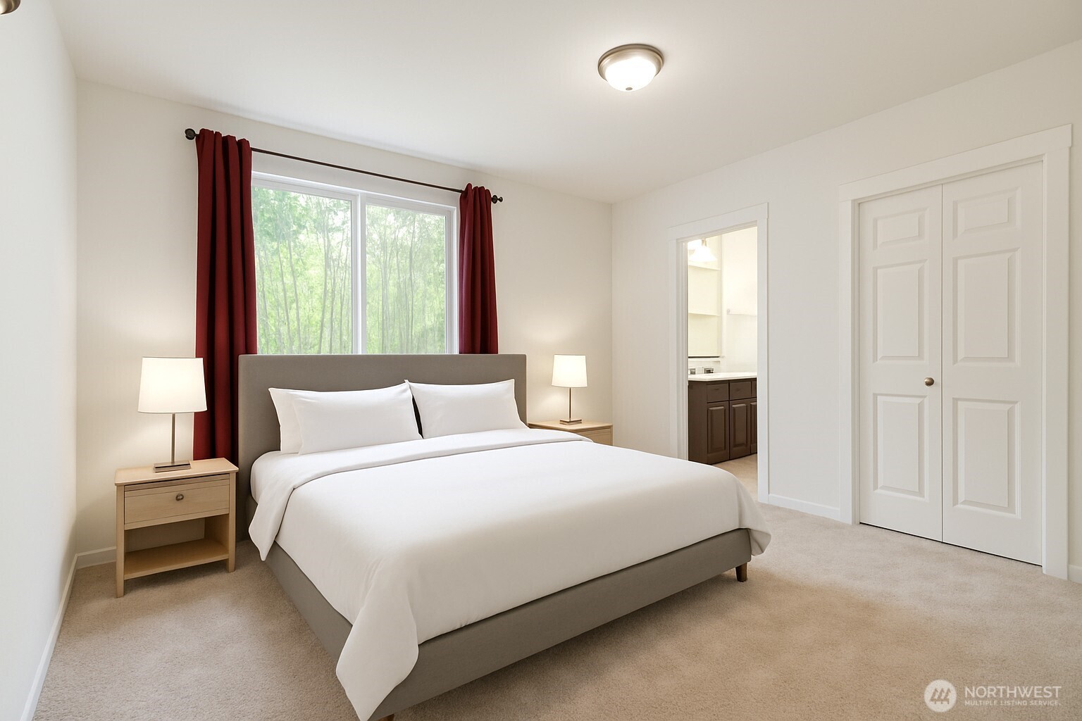 25025 Southeast Klahanie Boulevard, Unit D202 Issaquah, WA 98029 - Photo 5 of 23 a bedroom with a bed and a night stand