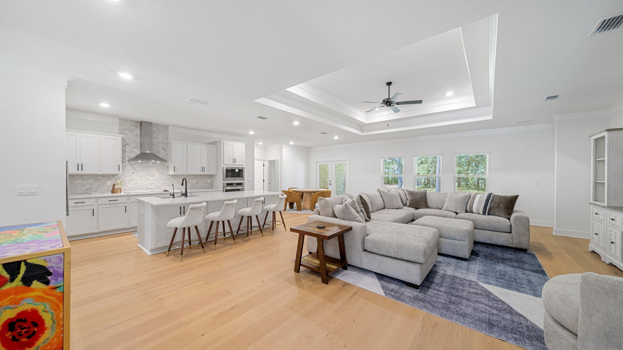 769 Old Ferry Road Santa Rosa Beach, FL 32459 - Photo 11 of 67 a living room with furniture and a chandelier