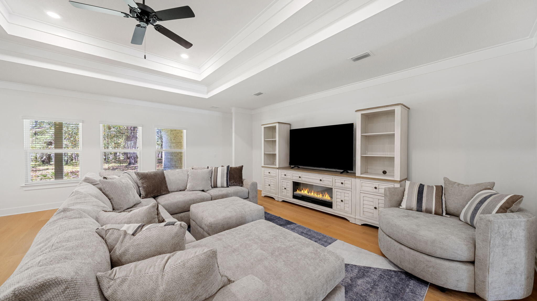 769 Old Ferry Road Santa Rosa Beach, FL 32459 - Photo 16 of 67 a living room with furniture and a flat screen tv
