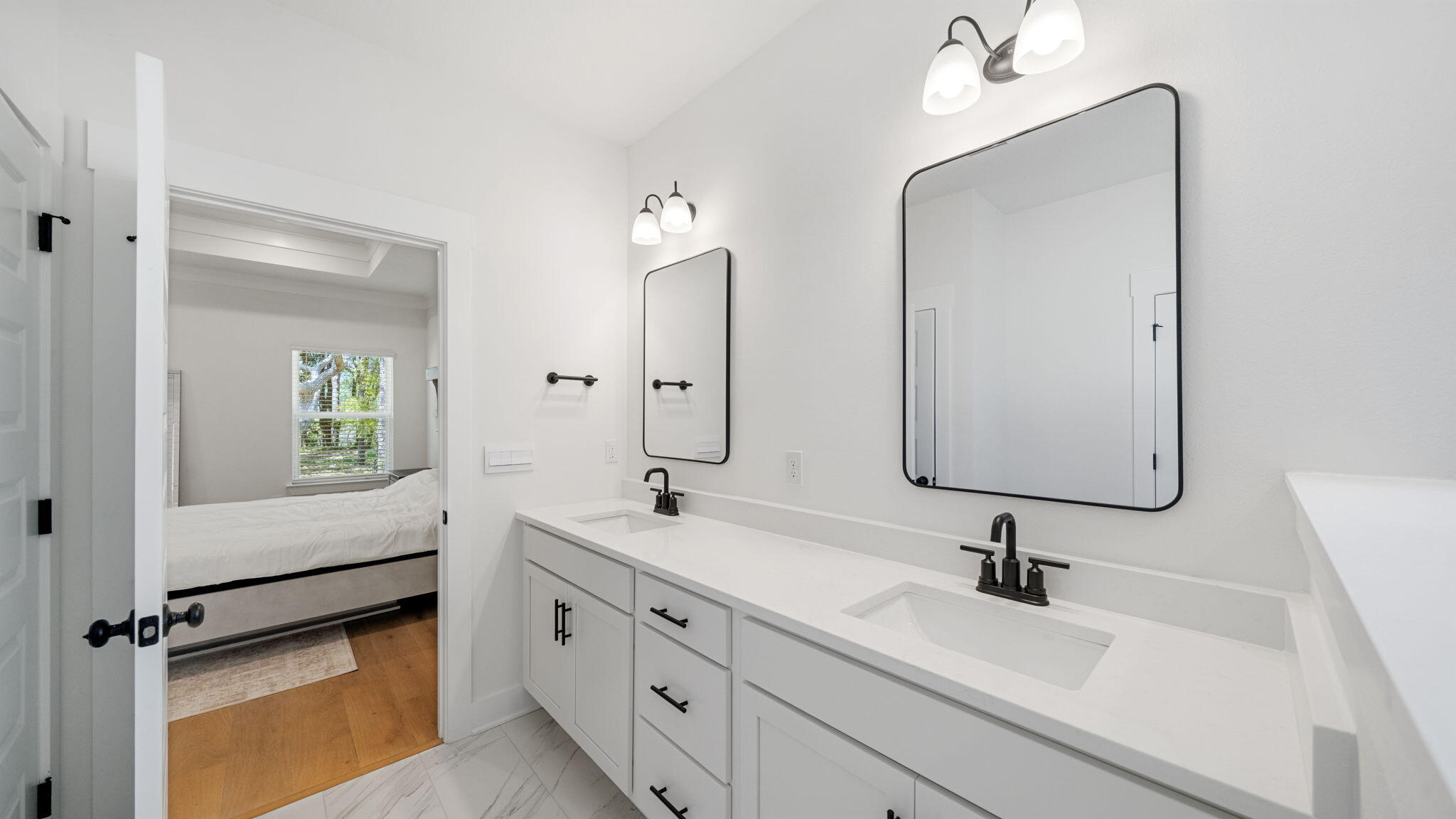 769 Old Ferry Road Santa Rosa Beach, FL 32459 - Photo 29 of 67 a bathroom with a double vanity sink and mirror