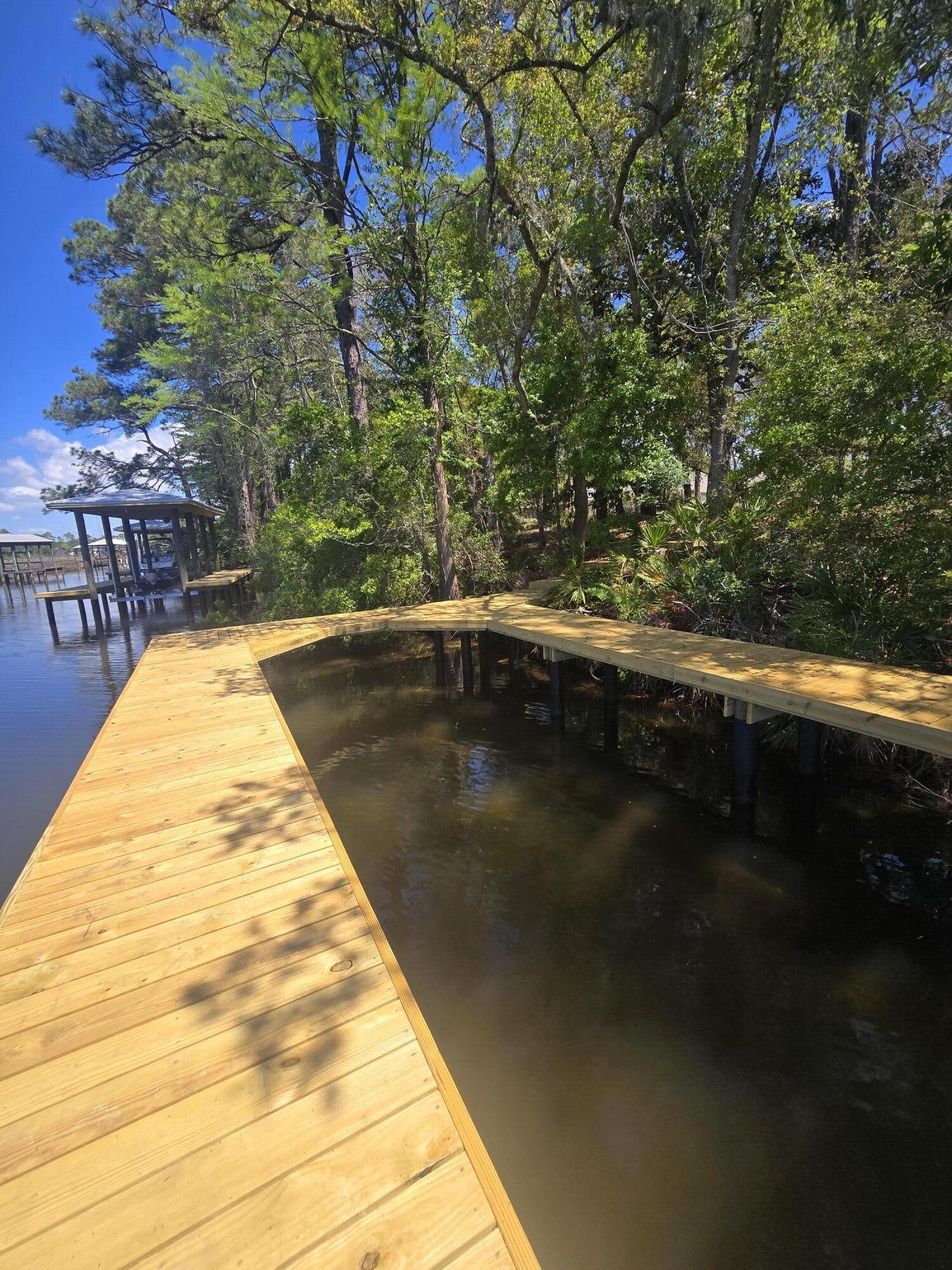 769 Old Ferry Road Santa Rosa Beach, FL 32459 - Photo 66 of 67 a view of swimming pool from a lake