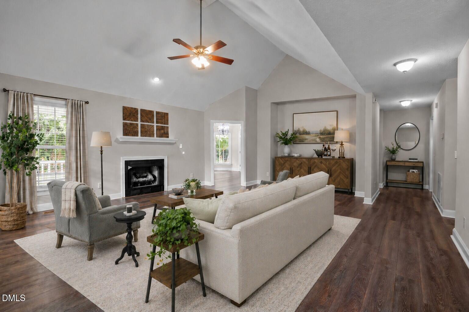 427 Fletcher Ridge Road Timberlake, NC 27583 - Photo 7 of 42 a living room with furniture and a fireplace