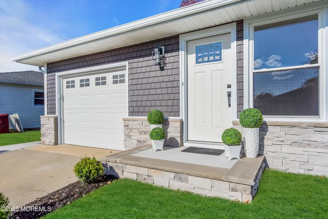 a front view of a house with patio