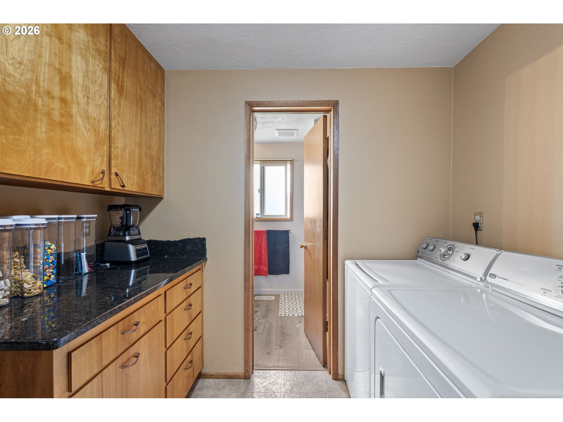 2465 17th Street Springfield, OR 97477 - Photo 34 of 47 a kitchen that has a sink and a stove