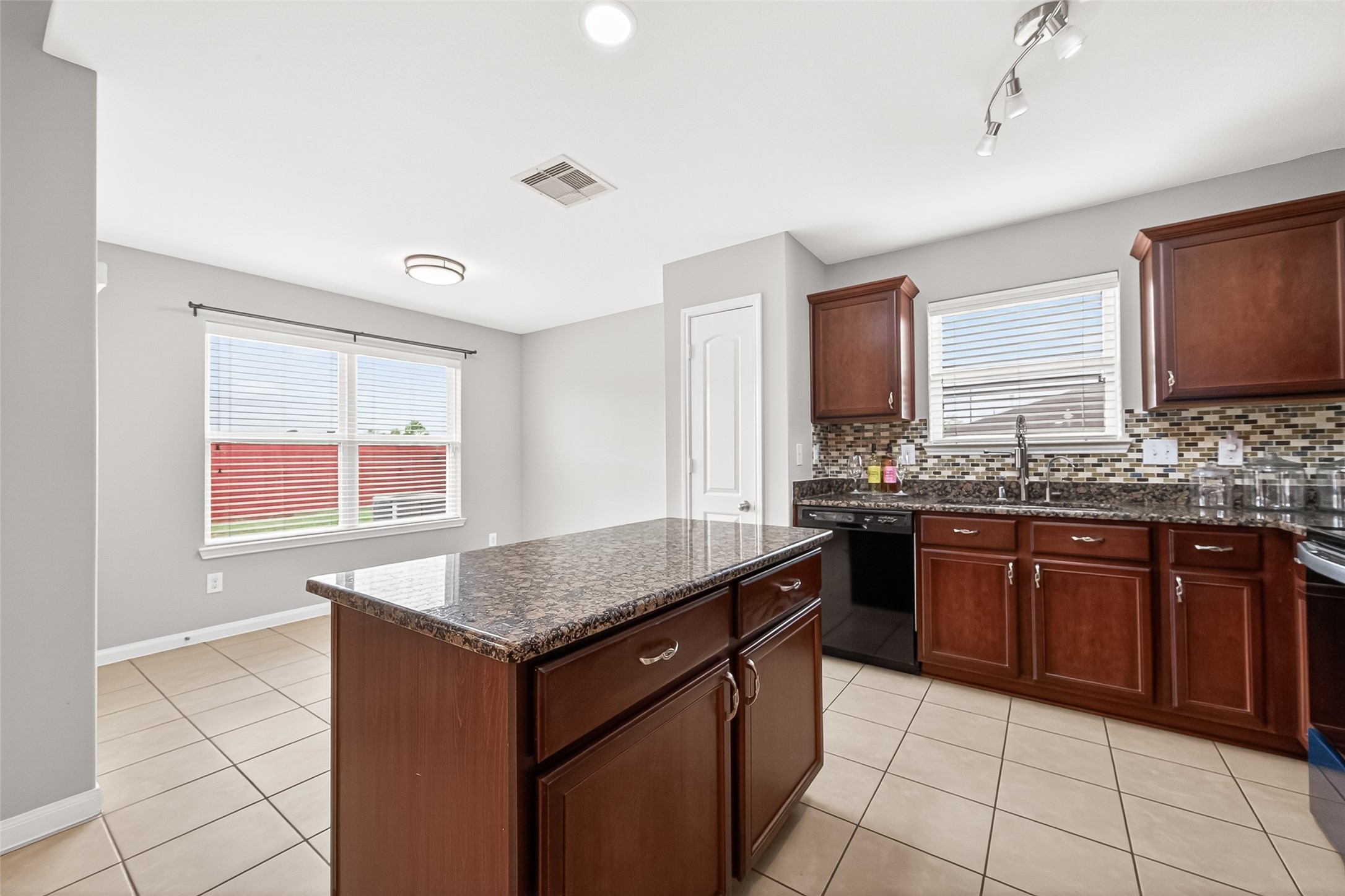2314 Seabourne Trails Road Rosenberg, TX 77469 - Photo 9 of 38 Kitchen island ready for your baking/cooking space, or entertaining! Also, additional drawers & cabinet space.