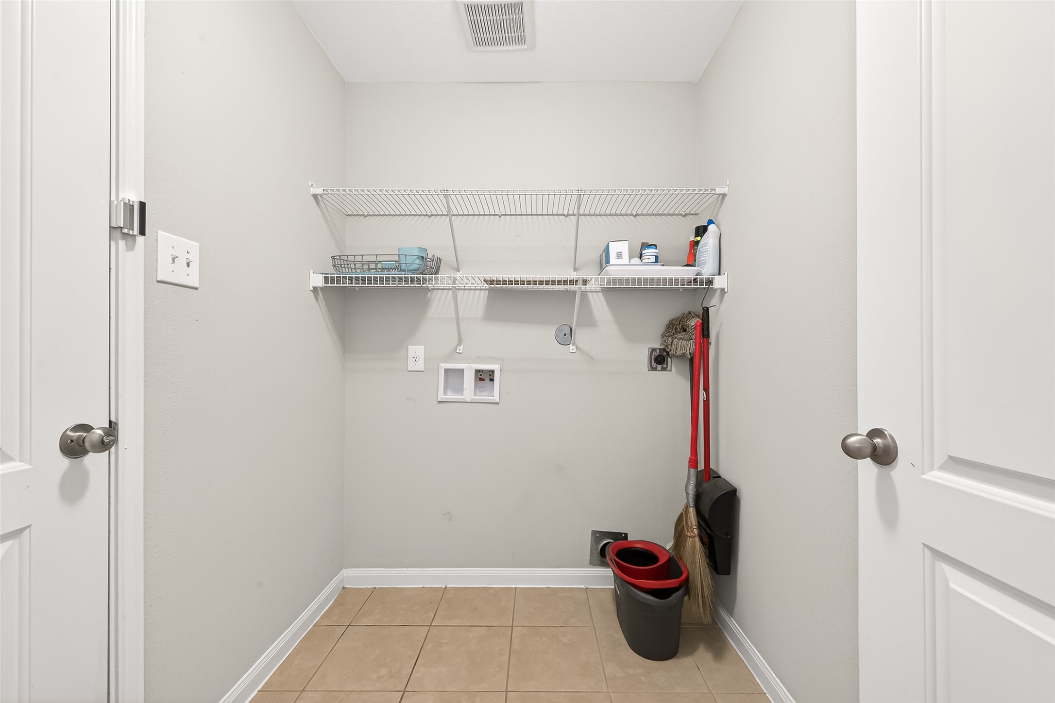 2314 Seabourne Trails Road Rosenberg, TX 77469 - Photo 24 of 38 Utility room for Washer & dryer with door to the garage & towards front of the home.