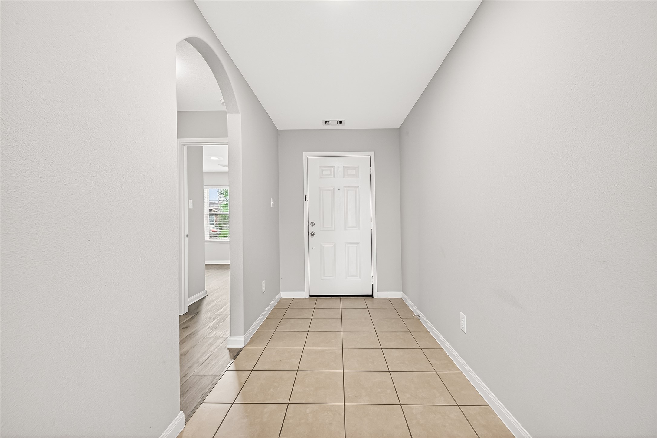2314 Seabourne Trails Road Rosenberg, TX 77469 - Photo 5 of 38 Front door to hallway where you'll see 2 bedrooms & a full bathroom. No carpet!