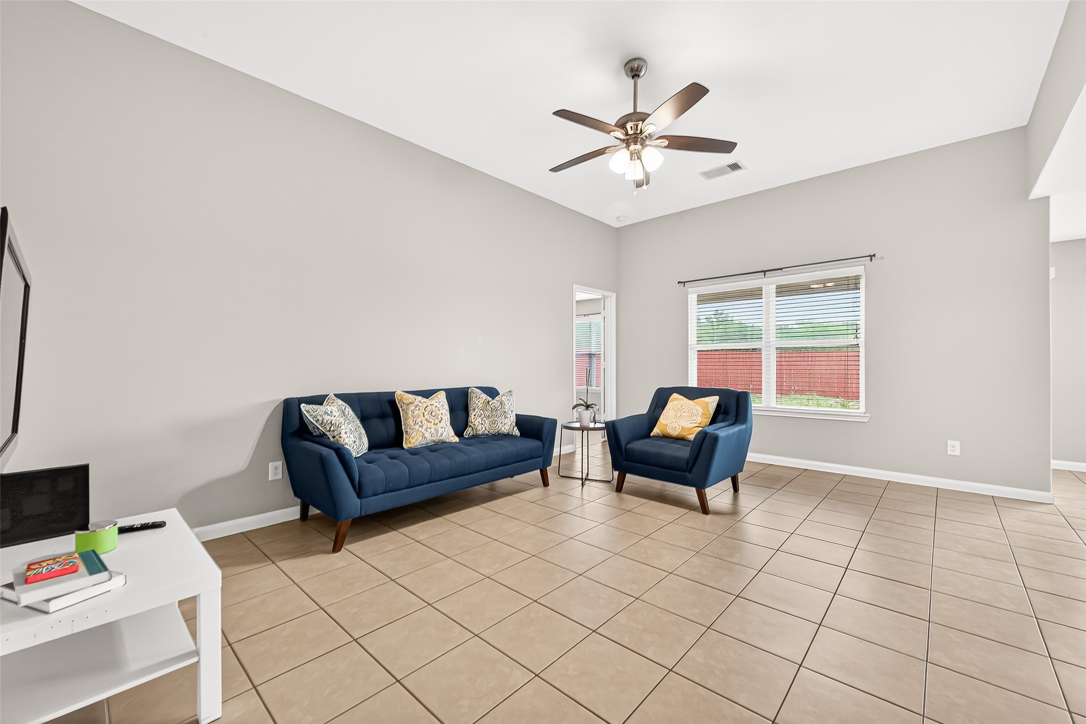 2314 Seabourne Trails Road Rosenberg, TX 77469 - Photo 36 of 38 Living room, open floorplan. Tile flooring throughout.