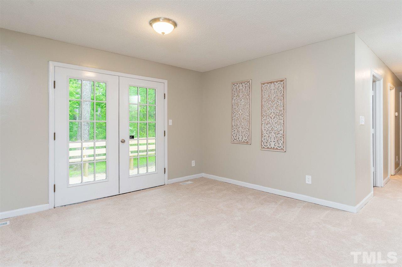 1508 Lawrence Road Creedmoor, NC 27522 - Photo 5 of 11 Dining Room with French Doors leading to back deck